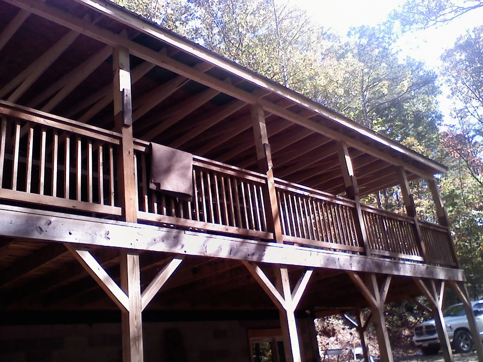 Timber framing under a new elevated porch and deck — Roof Leak Repair in Salt Lake City by Roofing Brothers